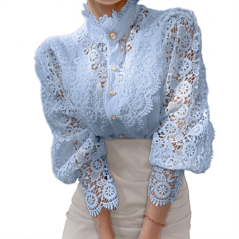 Light blue lace blouse with pearl buttons, stand collar, puff sleeves and lace cuffs