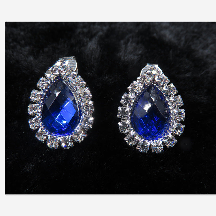 Diamond fashion necklace set earrings with blue crystal center and silver rhinestone halo