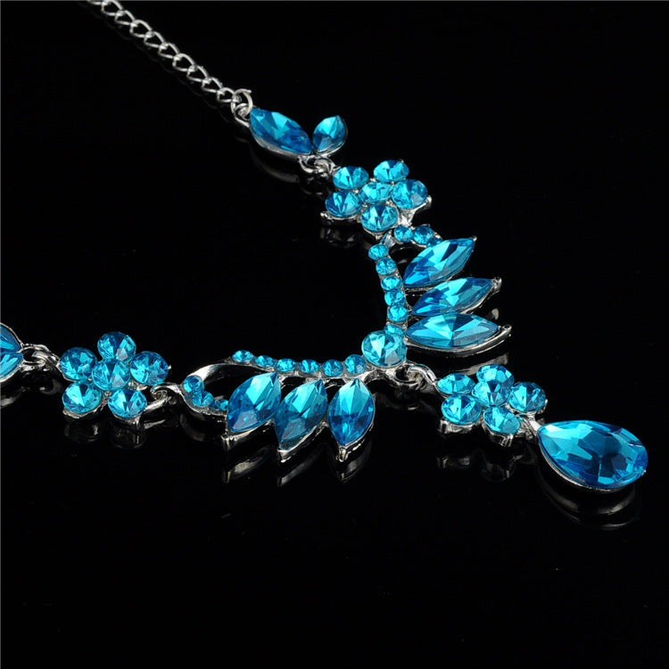 Blue crystal necklace pendant with teardrop charms on silver-tone chain