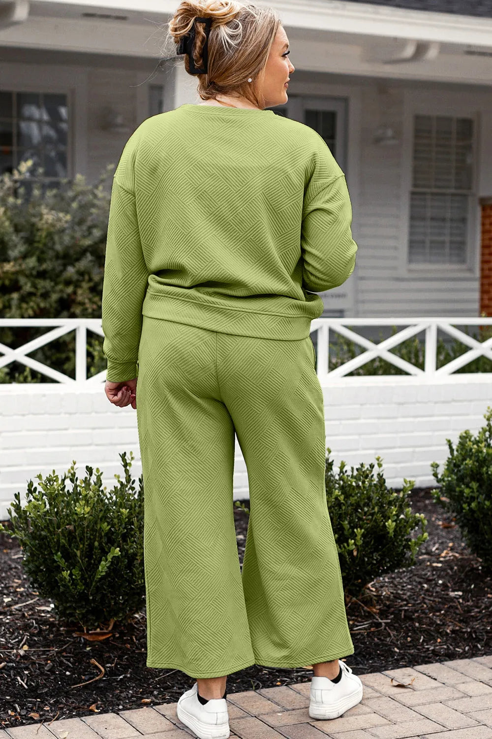 Green textured long-sleeve top and drawstring wide-leg pants set, back view