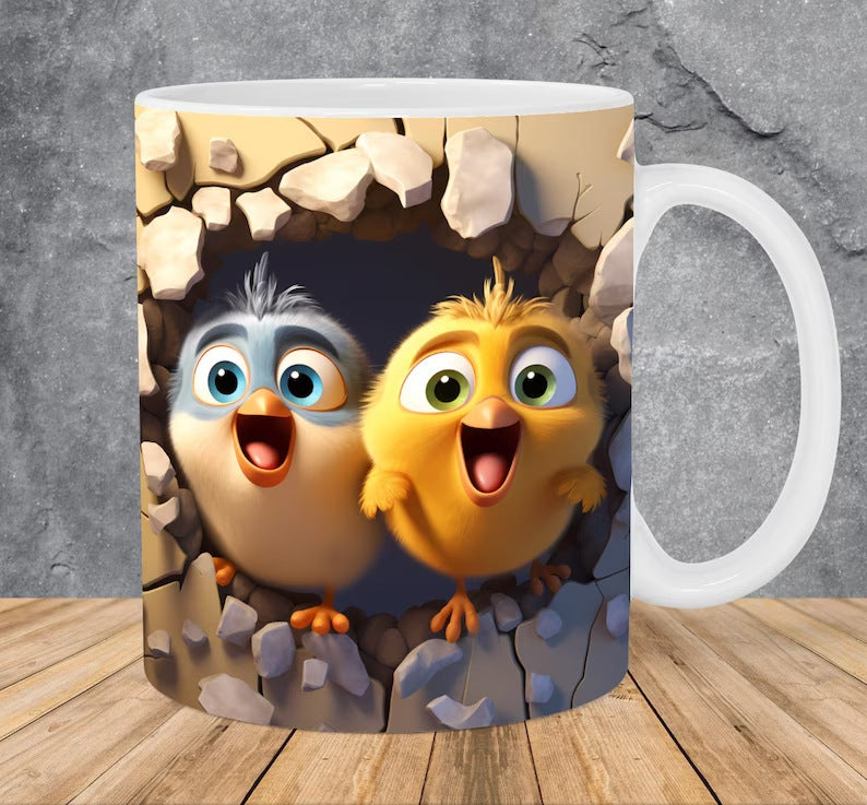 Ceramic coffee mug with two cartoon chicks peeking from a cracked cave, white handle