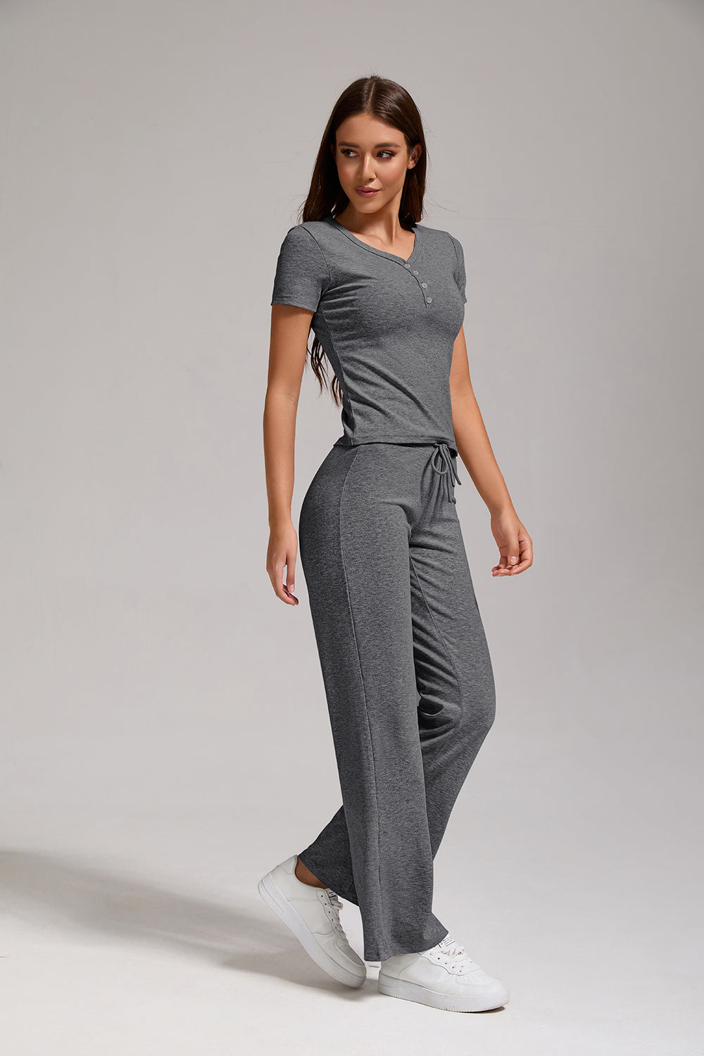 Women's Casual Two-piece Set With V-neck Button, Short Sleeved, Low Waisted Flared Pants, Sportswear