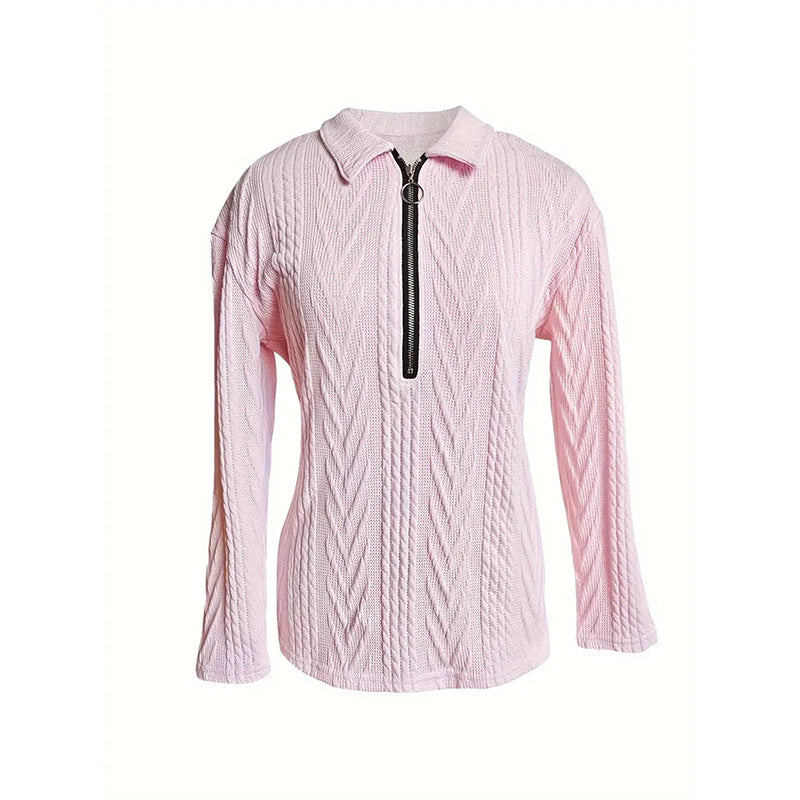 Pink textured zip-up collared long-sleeve top, front view with half-zip