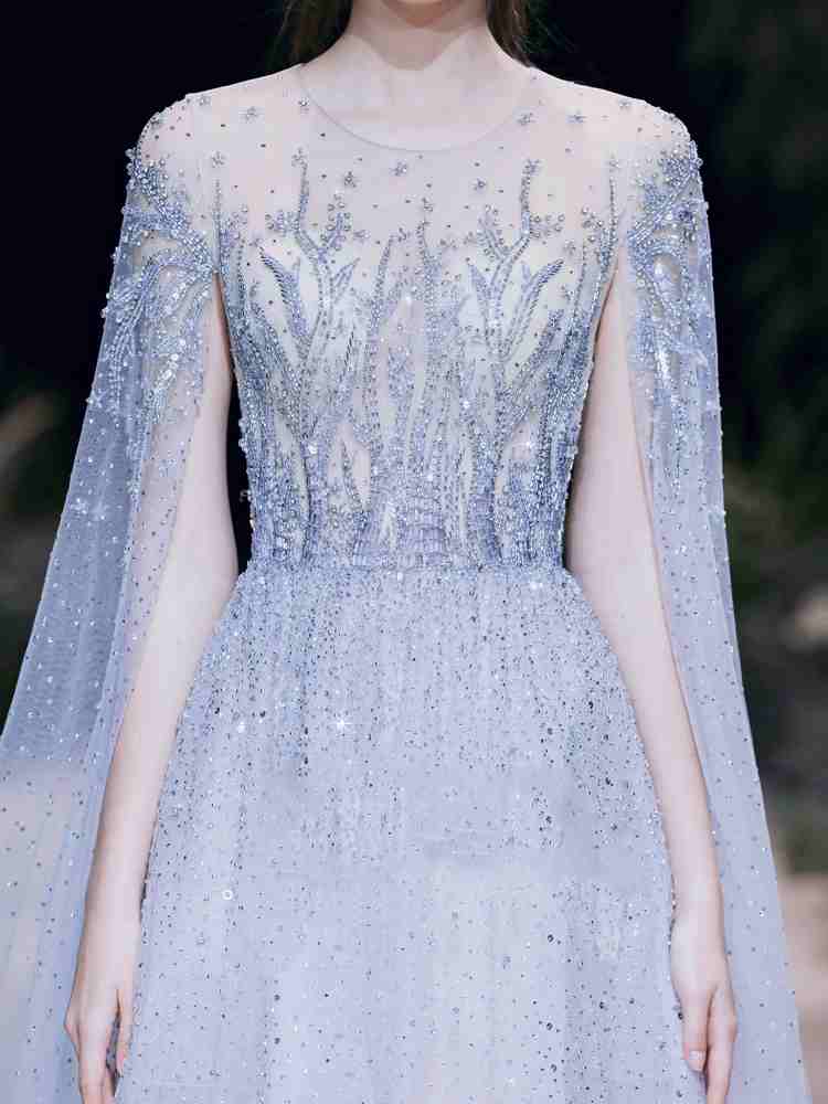 Light blue sequin bodice evening dress with sheer long sleeves