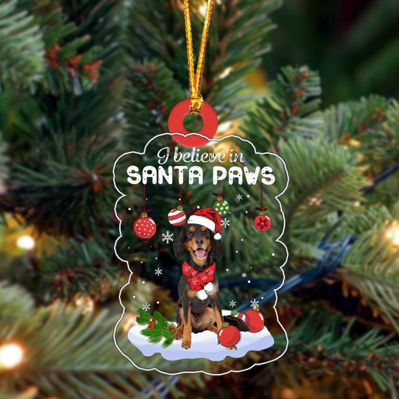 Dog Christmas ornament pendant, dark brown dog in Santa hat and red scarf, “Santa Paws”