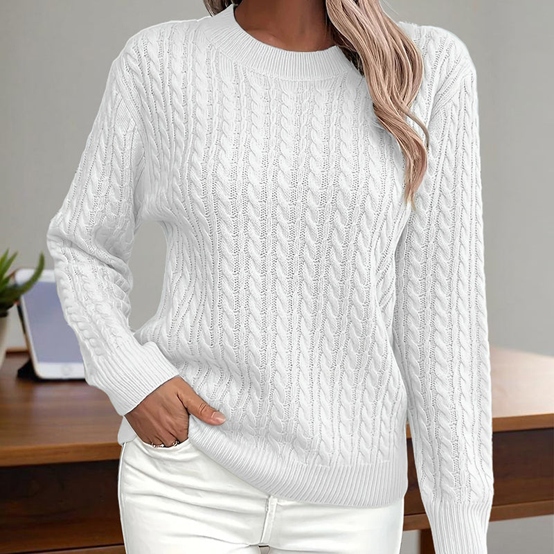 White textured crewneck sweater with long sleeves, pullover cable-knit pattern.