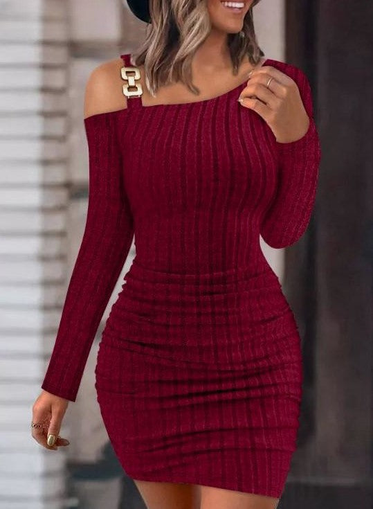 Wine red sheath dress with long sleeves and metal buckle strap at neckline, fitted off-shoulder.