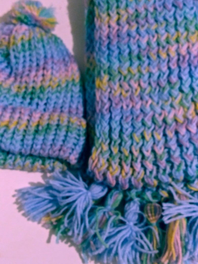 Knitted scarf fringe detail with multicolor stripes and textured weave