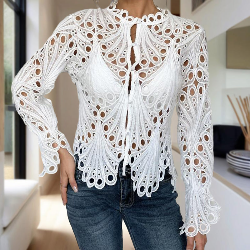 White lace hollow-out blouse with button front and scalloped lace trim on cuffs