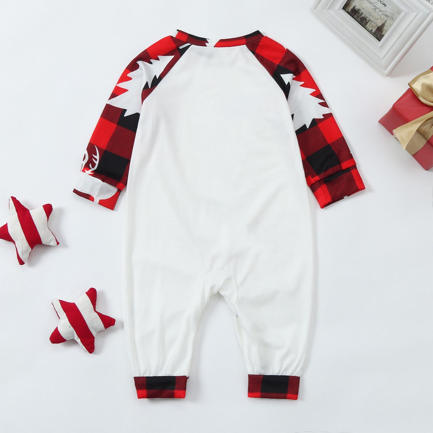 Kids Christmas deer print sleeper, white body with red/black plaid raglan sleeves and cuffs.