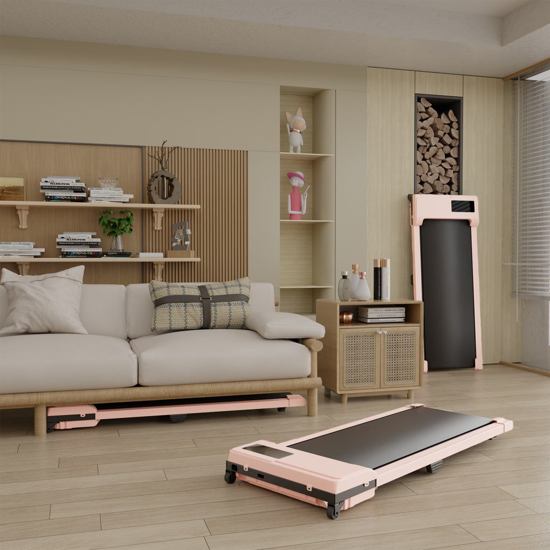 Pink portable walking pad treadmill placed on the floor in a living room