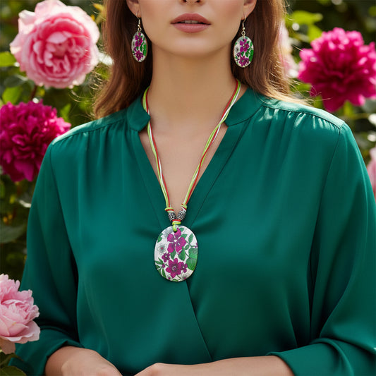 Floral shell necklace set with matching drop earrings, multicolor cord and oval pendant