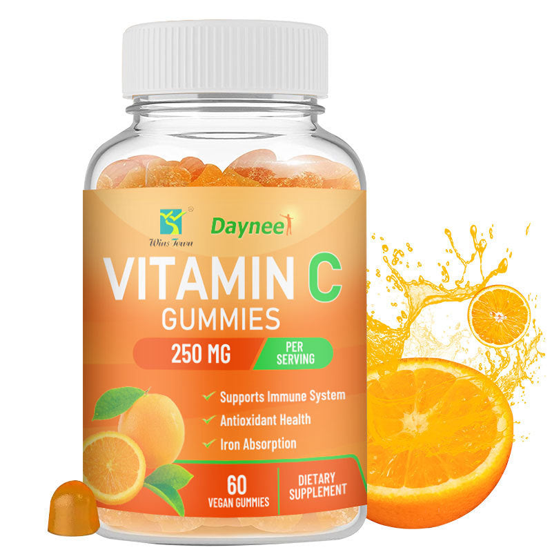 Gummy supplement bottle filled with orange gummies and white ribbed cap