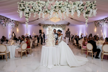 White lace wedding gown with embroidered bodice and full skirt