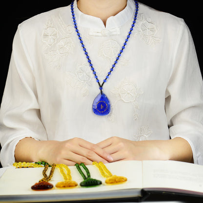 Glass pendant Buddha statue