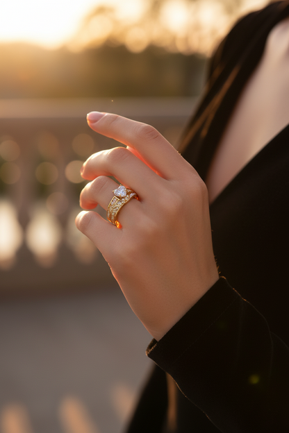 Gold-toned zircon ring with square centerpiece and curved side stones