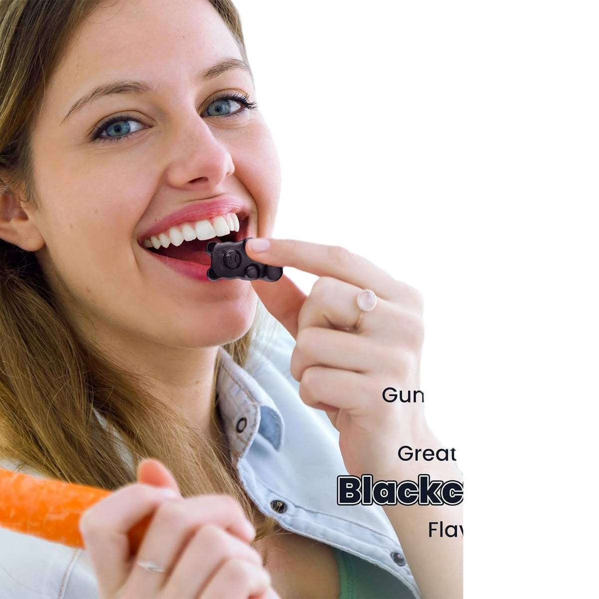 Woman taking black seed oil gummies, holding a dark bear-shaped gummy