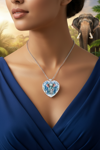 Heart-shaped blue crystal pendant elephant necklace with silver chain on neckline