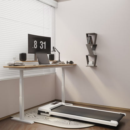 White folding walking treadmill in a home office with extended black running deck