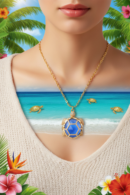 Gold-tone turtle charm necklace with blue pendant medallion and small turtle links.