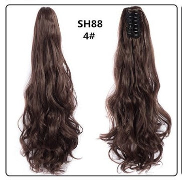Claw clip ponytail hair extension in dark brown, long wavy strands