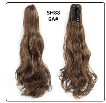 Claw clip ponytail hair extension in light brown, long wavy strands