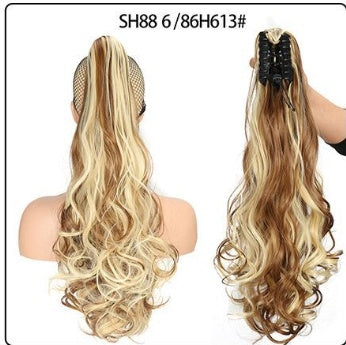 Claw clip ponytail hair extension in light blonde, long wavy strands
