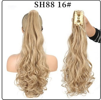 Claw clip ponytail extension with long wavy blonde hair, mesh base and clip