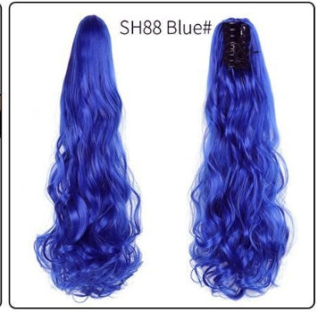 Natural-looking royal blue wavy ponytail hair extension with black claw clip