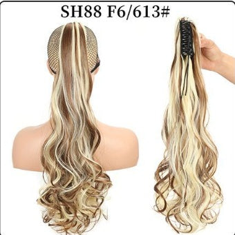Natural-looking blonde streak wavy ponytail hair extension with black claw clip
