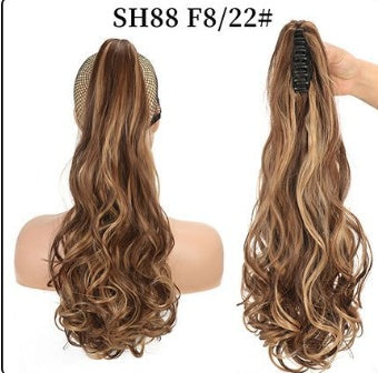 Natural-looking dark brown wavy ponytail hair extension with brown claw clip