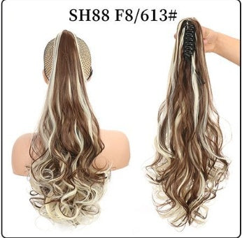 Natural-looking caramel and blonde wavy ponytail hair extension with beige claw clip