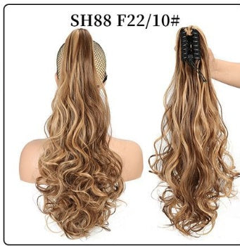 Claw clip ponytail hair extension with long curly waves, light brown hair.