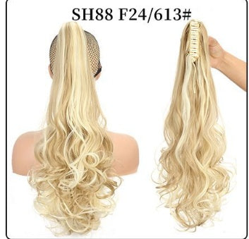 Claw clip ponytail hair extension with long wavy curls, blonde hair.