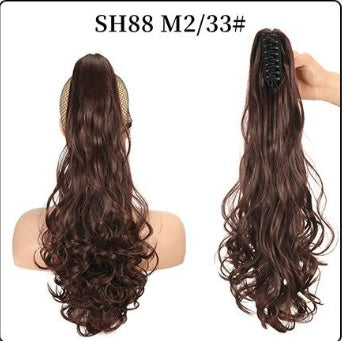 Claw clip ponytail hair extension with long loose curls, deep dark brown hair.