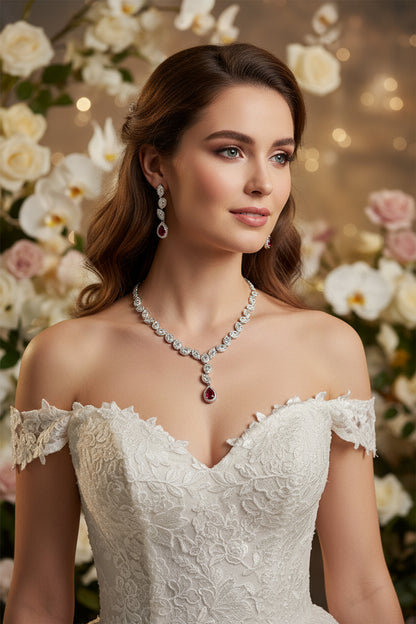 Zircon necklace and drop earrings set, silver-toned with red center stone