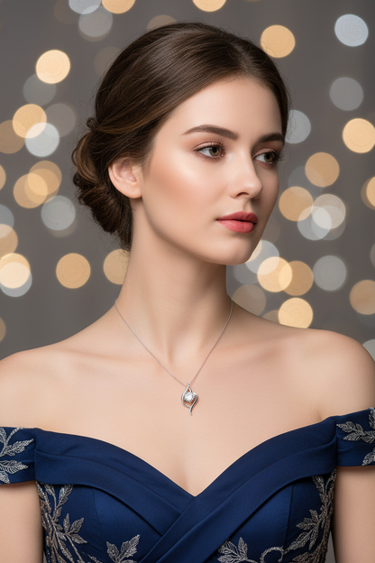 Silver pendant necklace with teardrop charm pendant on thin chain
