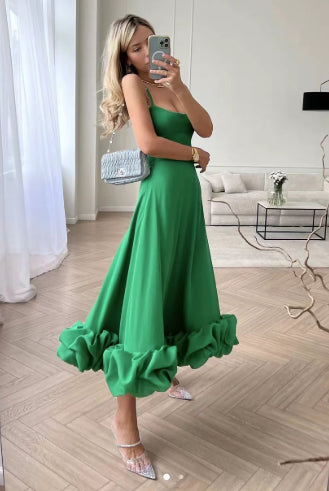 Green A-line dress with spaghetti straps and 3D flower hem ruffle