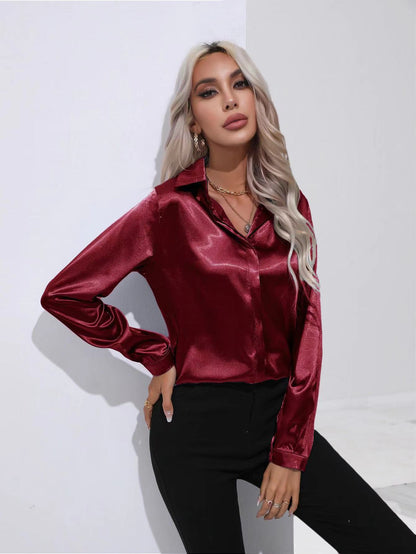 Dark red satin button-up long-sleeve shirt with one-button placket and pointed collar.