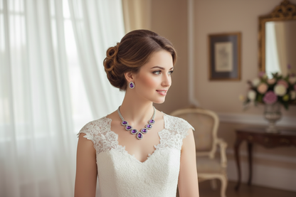 Diamond fashion necklace set with purple teardrop stones and matching stud earrings