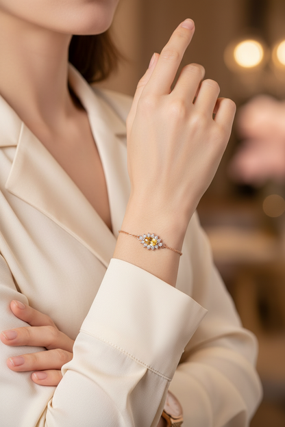 Rose gold tennis bracelet with citrine-style center charm and clear zircon accents