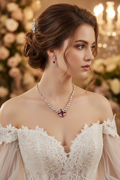 White lace wedding dress with off-shoulder sleeves, floral necklace and matching drop earrings