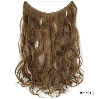 Seamless one-piece hair extension wig with wavy light brown hair, no visible part
