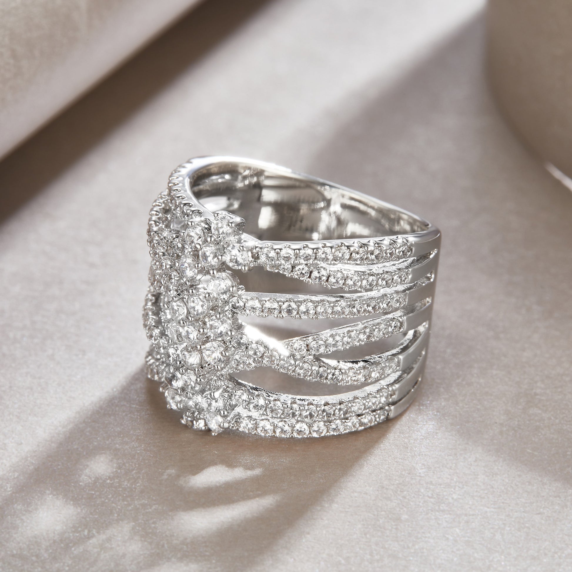 Silver statement wedding band with wide sparkling pave design