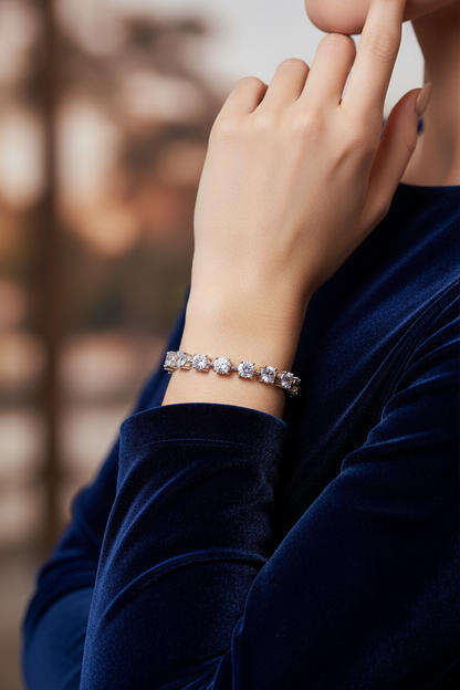 Silver bracelet with rectangular-linked diamond-style stones on wrist