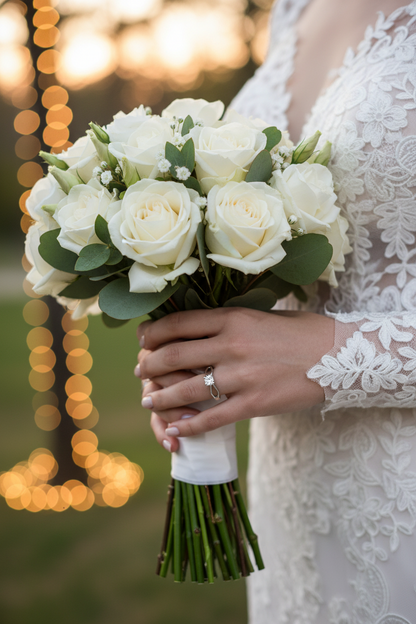 Crystal bracelet and ring detail with bridal bouquet; matching wedding jewelry set