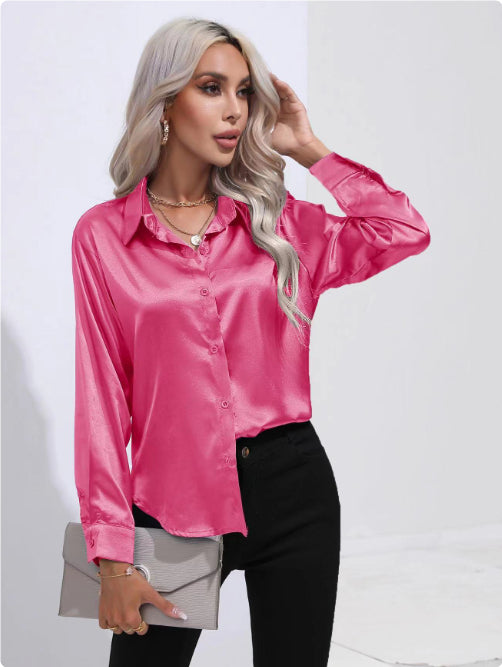 Pink satin button-up long-sleeve shirt with one-button placket and pointed collar.