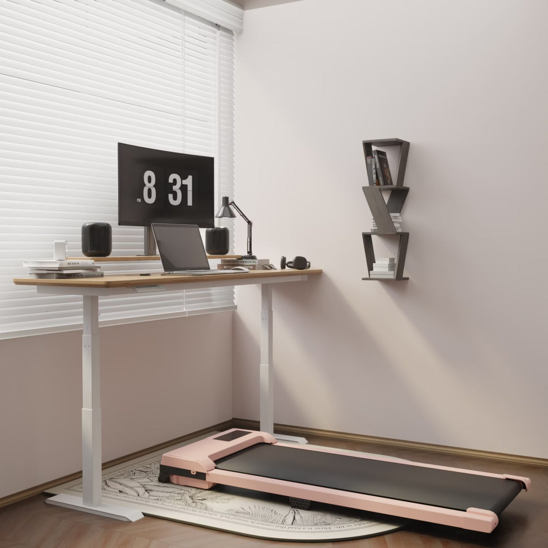 Pink walking pad treadmill with black belt and console, set up indoors on a rug