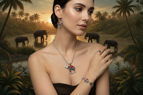 Elephant jewelry set with silver-tone necklace, matching earrings, and bracelet
