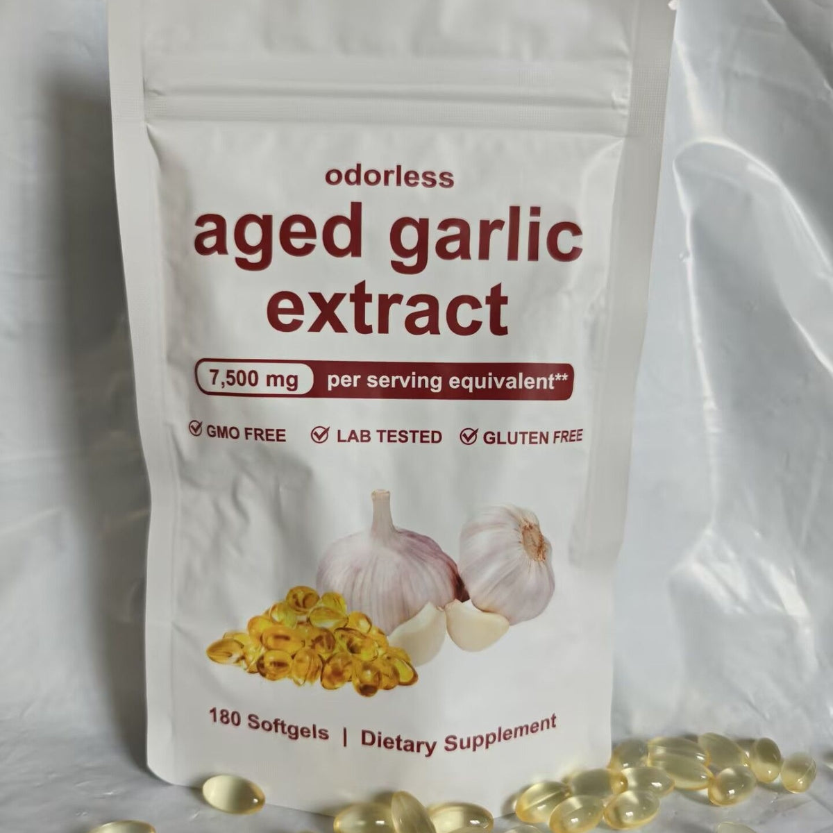 Odorless aged garlic extract pouch with 180 softgels and garlic clove graphic